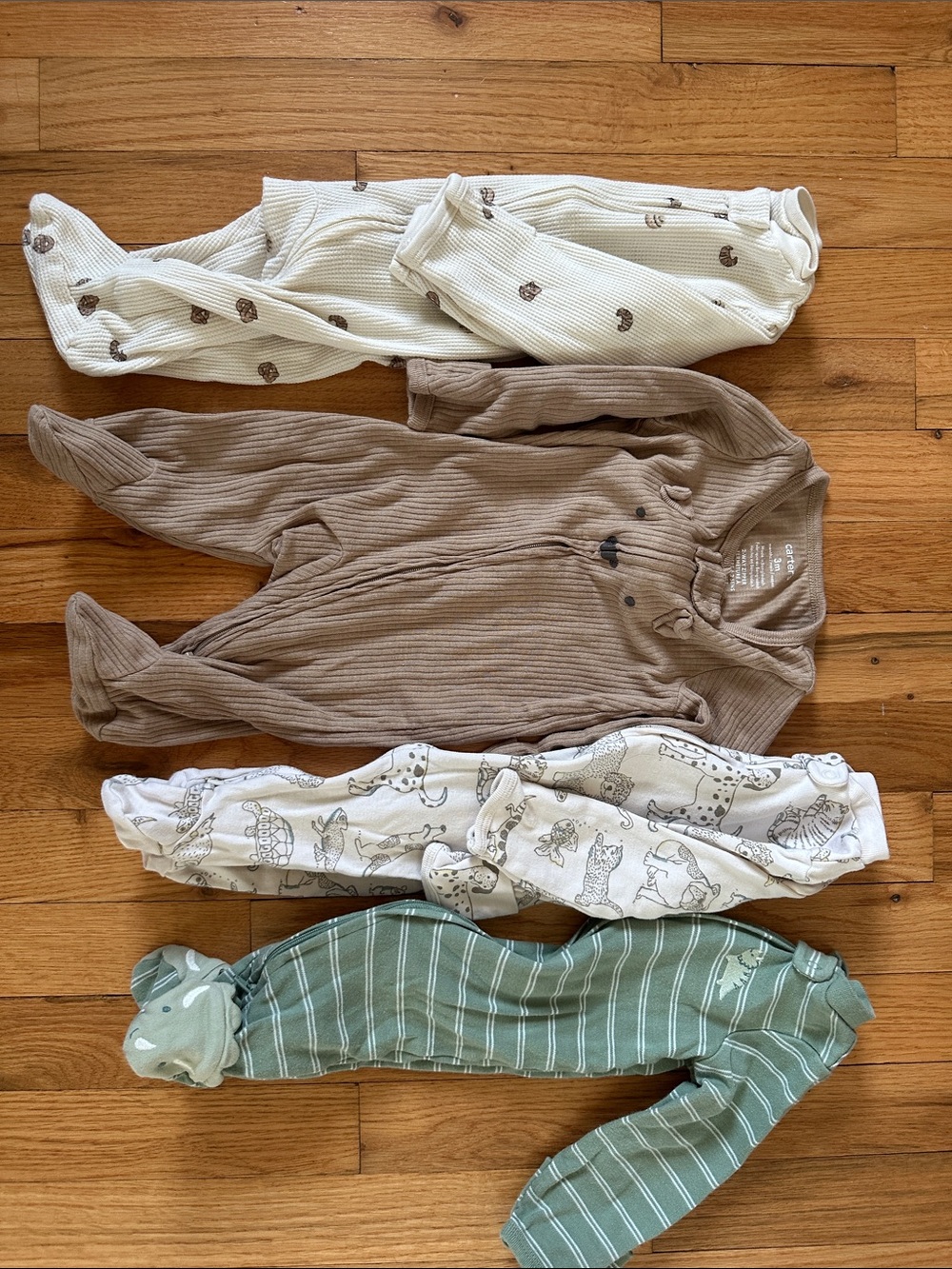 Carter’s Baby Cotton 2-Way Zip Sleep & Play
Pajamas - 4 Pack
